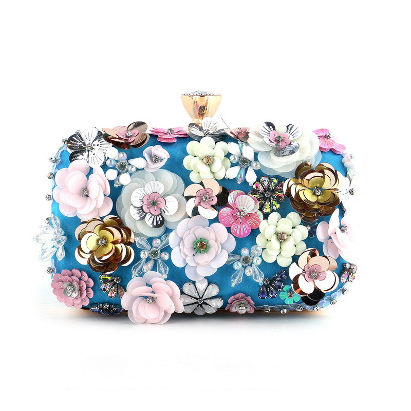 Pochette Rhodolite Pervenche Paris – soirée ornée de fleurs