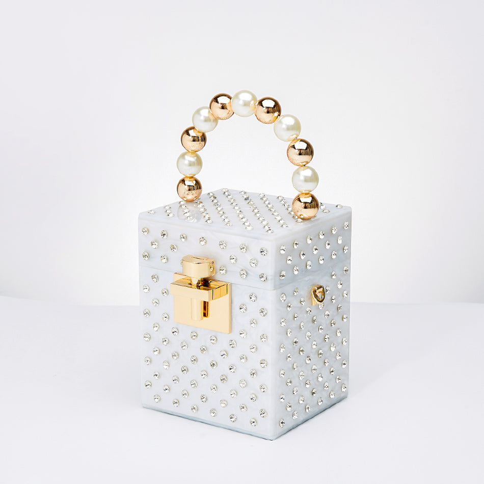 Minaudière Acrux Pervenche Paris – cristal à anse perlée